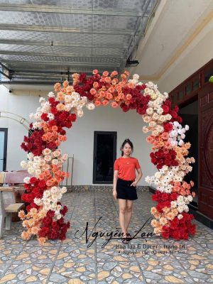 cổng cưới tròn tông cam kem đỏ - CC026